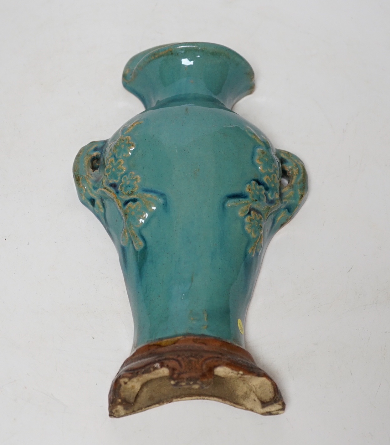 A Chinese Guandong turquoise glazed pottery wall vase, early 20th century, 25cm high